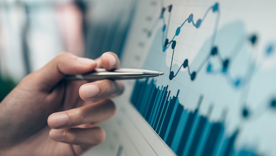 Working,On,Desk,Office,And,Use,Pen,To,Pointing