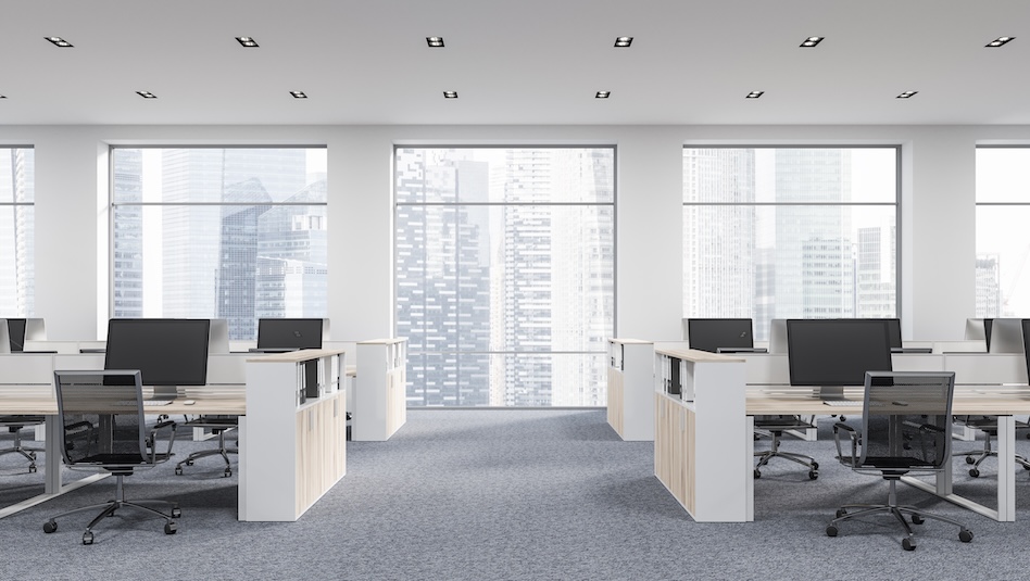 Empty office with computers and chairs